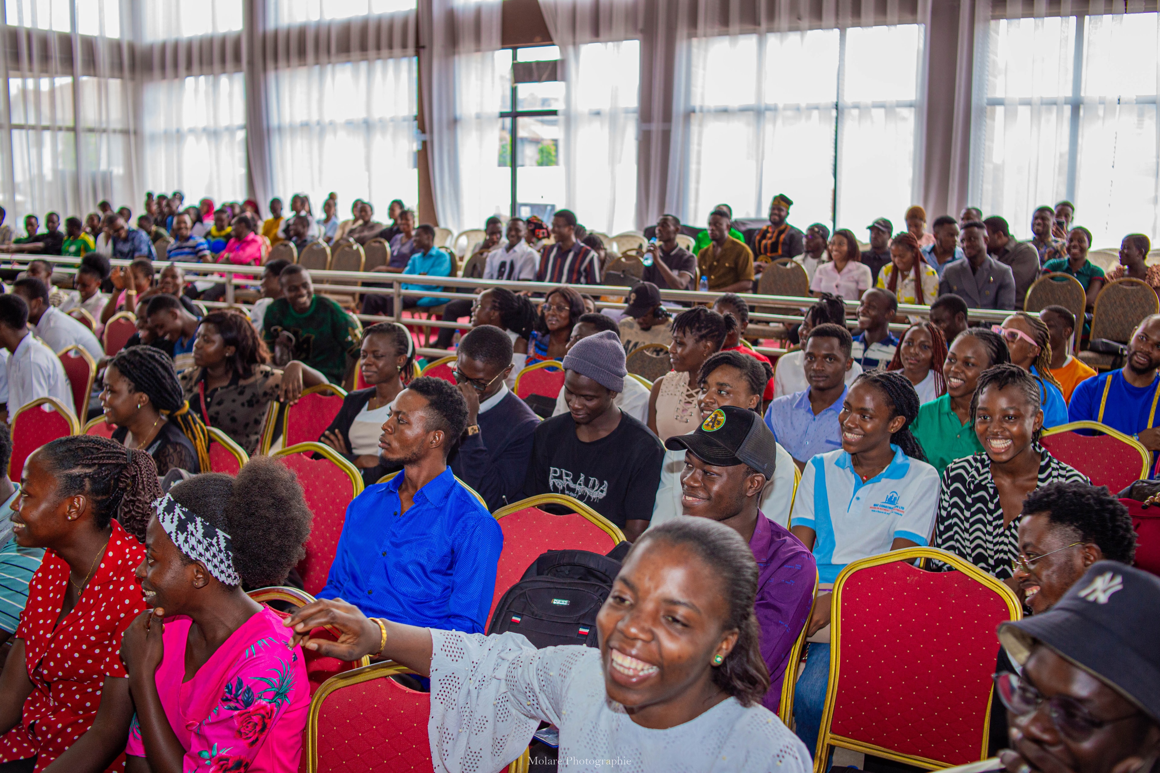 Attendees seated in rows during a past Hustlers Conference session.